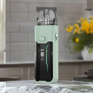 Vapoeresso Luxe XR Review: Vape in green, sitting on a marble countertop.