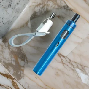 Blue Joyetech Ego AIO2 vape with a USB C charger on a countertop.